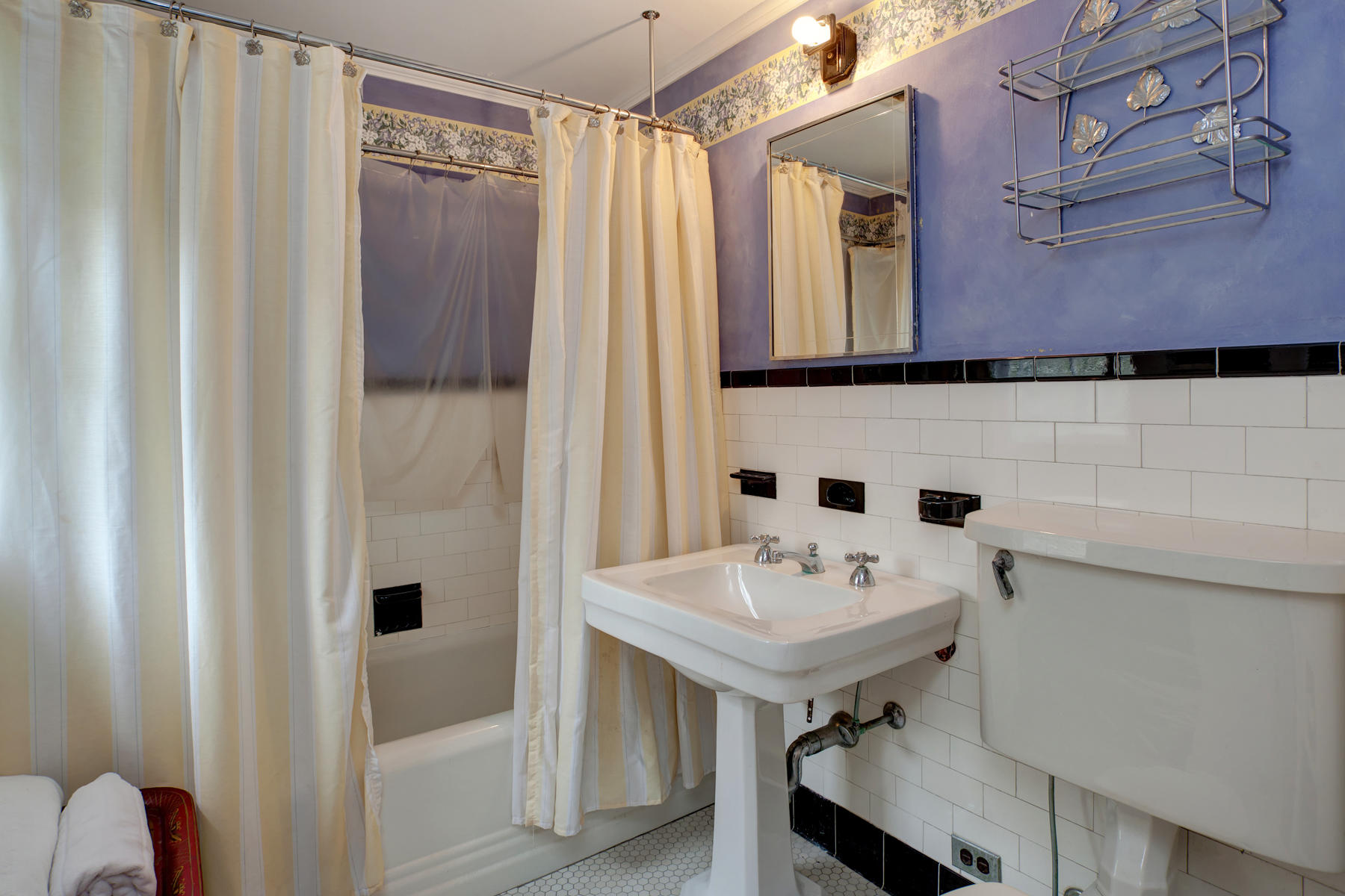 463 Main Street Centerville, MA 02632 - Photo 28 of 36 a bathroom with a sink and a mirror