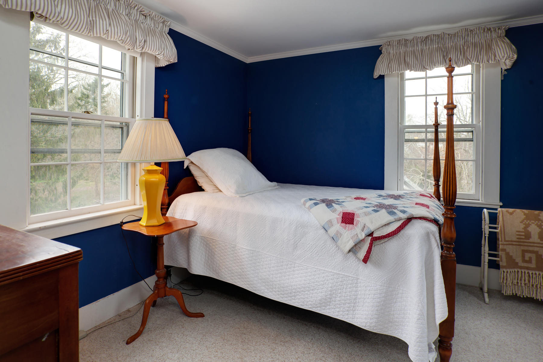 463 Main Street Centerville, MA 02632 - Photo 34 of 36 a bedroom with a bed and a window