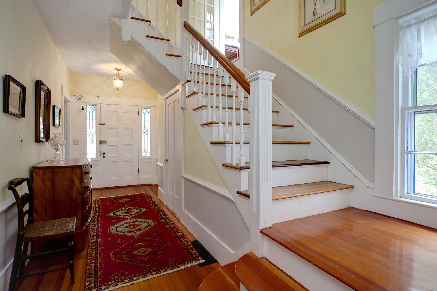 463 Main Street Centerville, MA 02632 - Photo 6 of 36 a view of an entryway with wooden floor