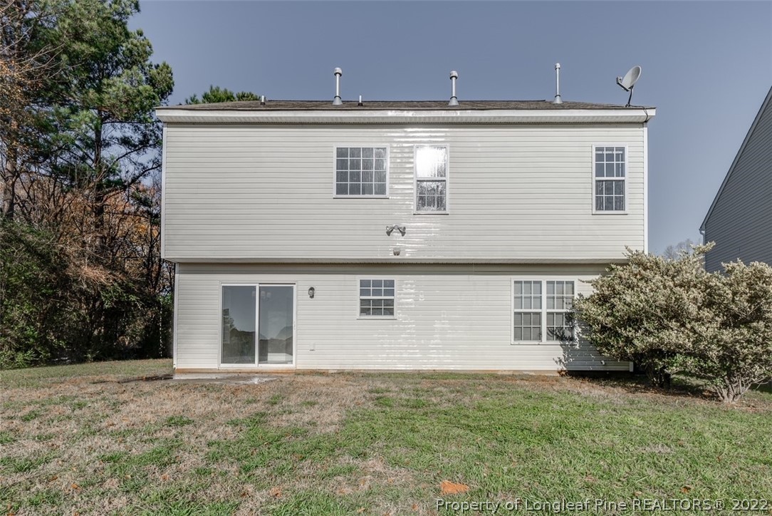3104 Guiding Light Road Raleigh, NC 27610 - Photo 34 of 36 a front view of a house with garden