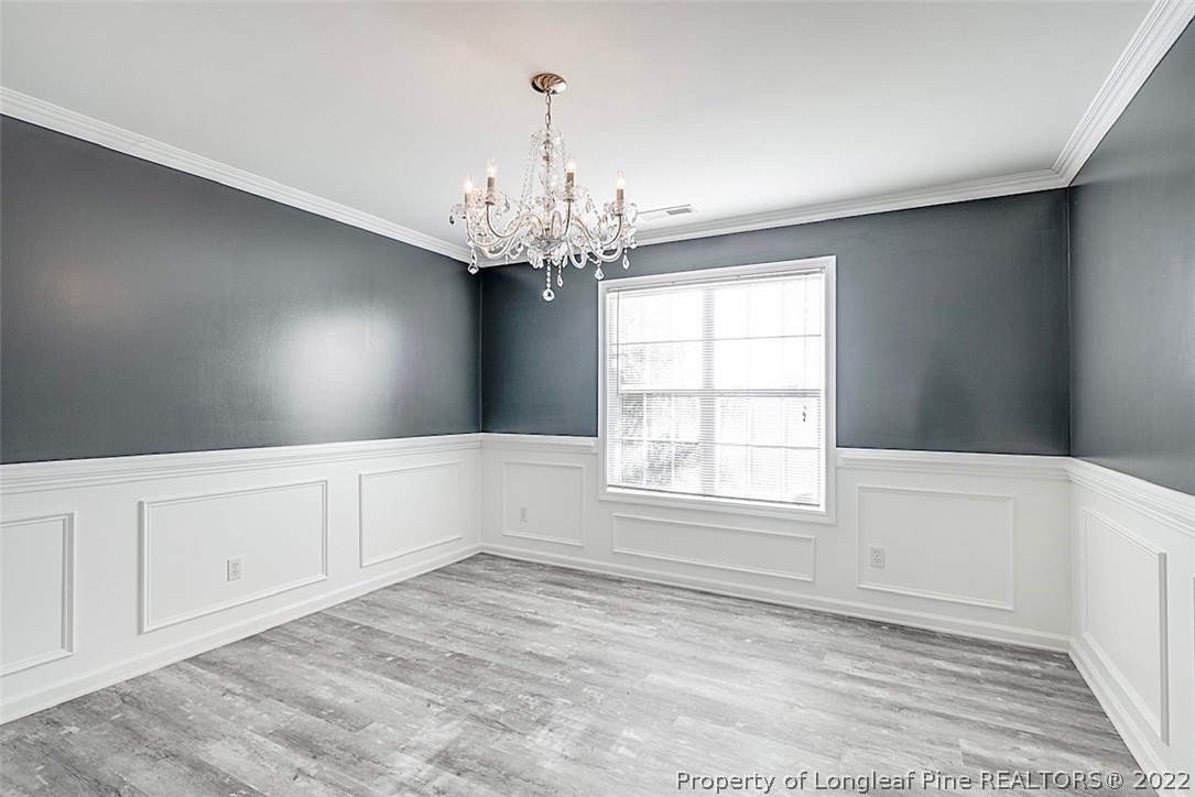 3104 Guiding Light Road Raleigh, NC 27610 - Photo 6 of 36 a view of an empty room with window