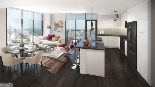 a very nice looking dining room with a large window