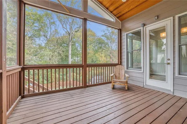 a view of outdoor space with wooden floor and wooden floor