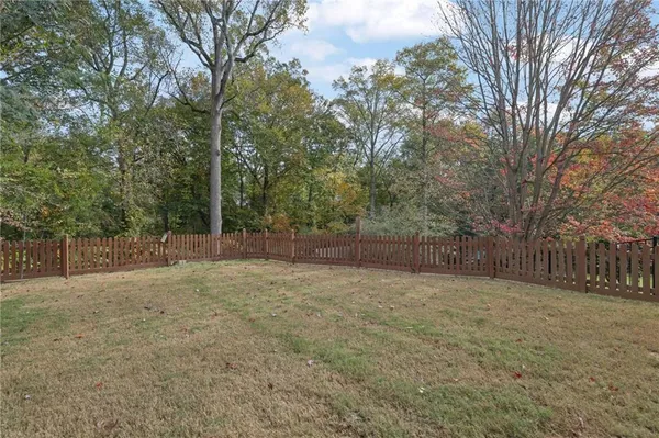 a house with trees in front of it