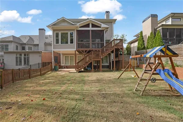 a view of an house with backyard