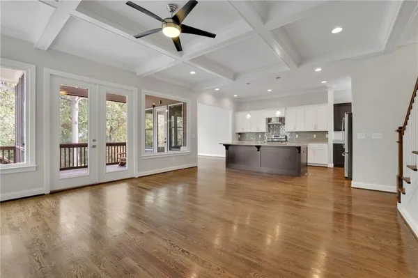 a view of kitchen with wooden floor and window