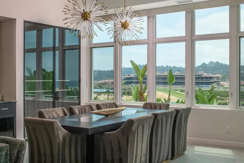 a view of a room with a large window