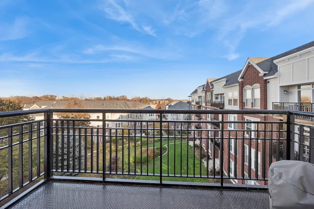 a view of a balcony with city view