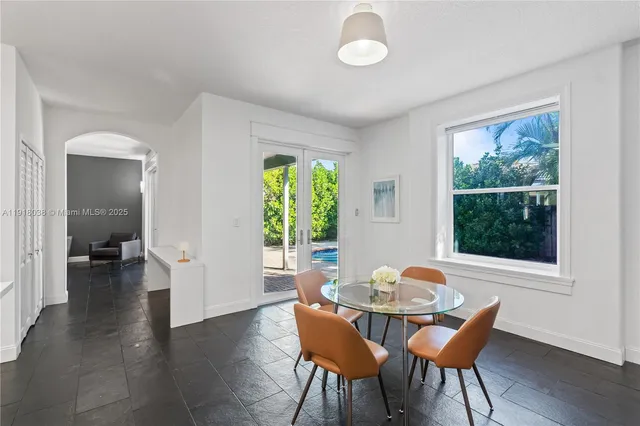 a bathroom with a sink toilet vanity and shower