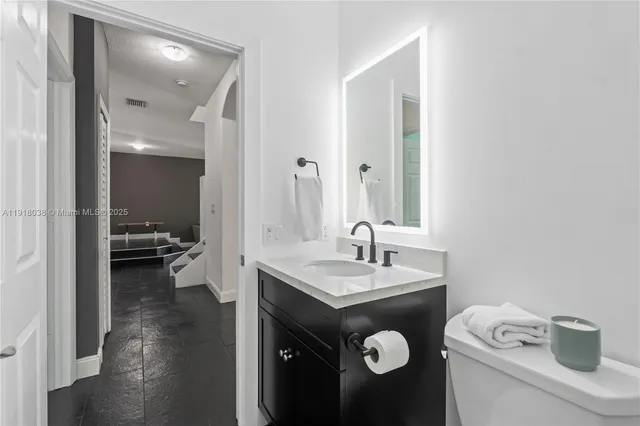 a bedroom with a bed and a closet