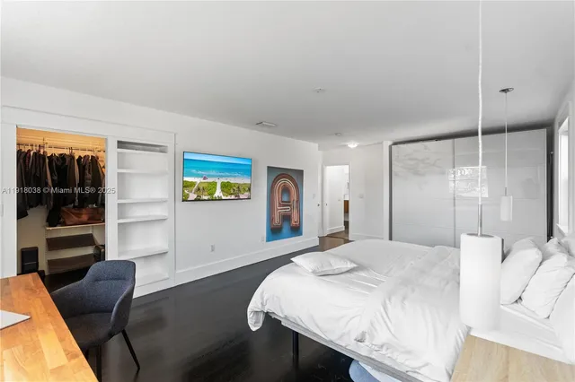 a bathroom with double vanity sink and mirror