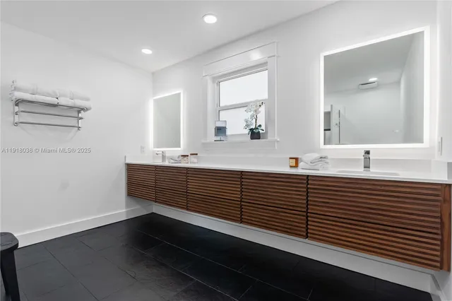 an empty room with a bench