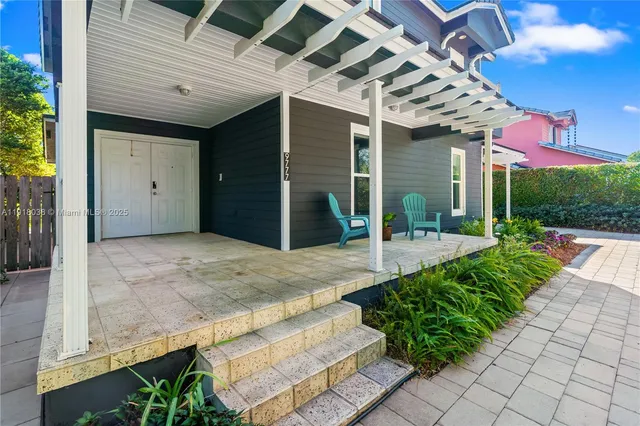 a living room with furniture and a couch