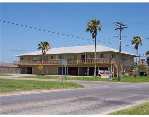 a view of a building with a garden area