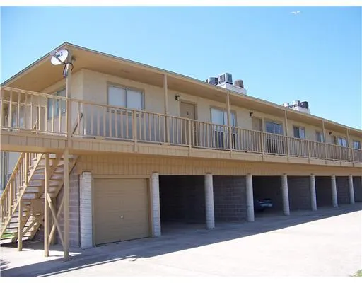 a balcony with furniture and window