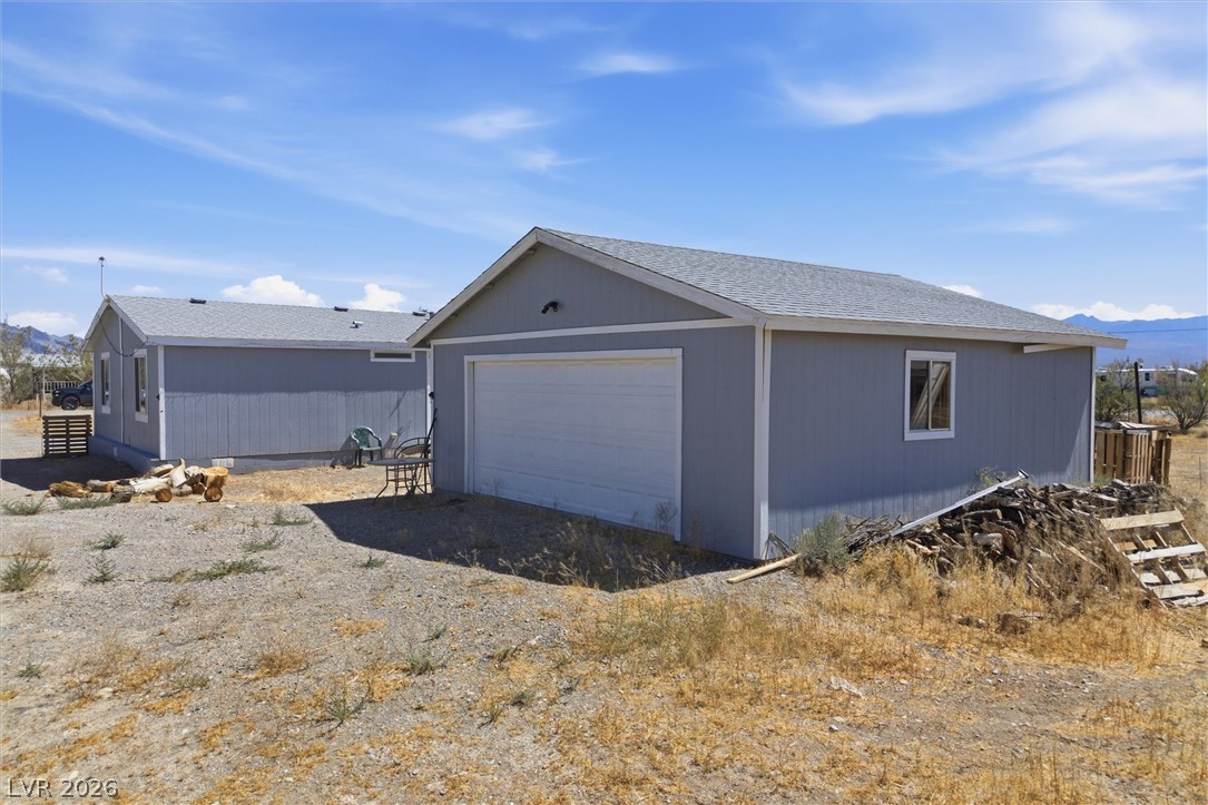 4331 Retread Road Pahrump, NV 89048 - Photo 24 of 31 A well-maintained detached garage and utility building offer versatile space.