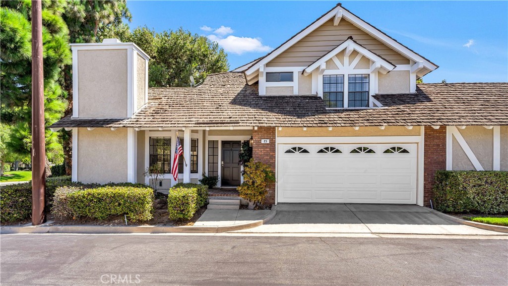 A Classic! Such beautiful curb appeal. Newer sectional roll up garage door
