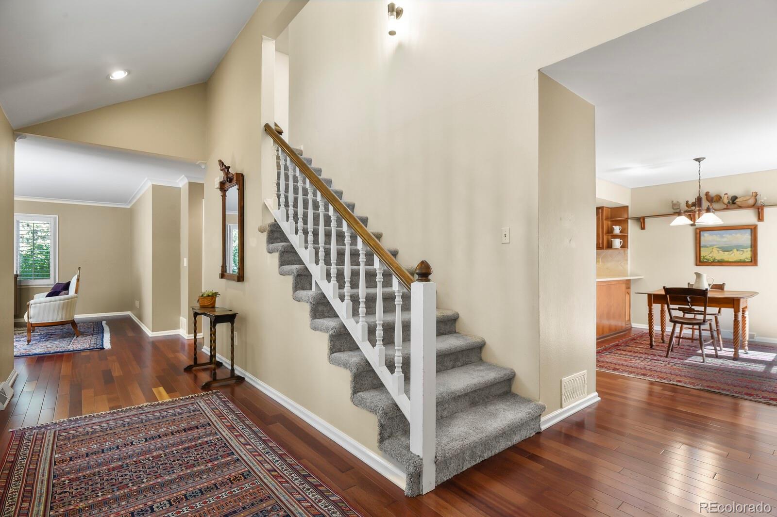 4530 South Verbena Street, Unit 309 Denver, CO 80237 - Photo 9 of 45 a view of entryway and hall with wooden floor
