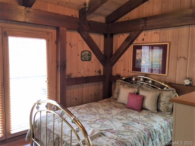 341 Mcmurray Road Rutherfordton, NC 28139 - Photo 22 of 44 a bedroom with a bed next to a window with the outer view
