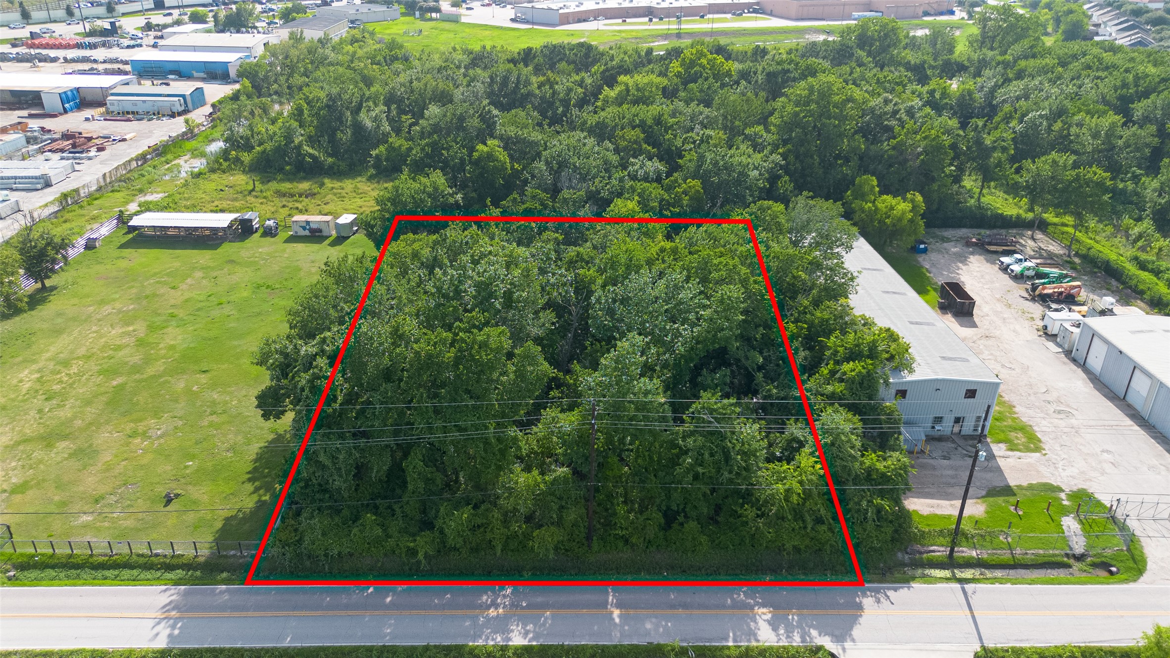 12317 Mosielee Street Houston, TX 77086 - Photo 1 of 15 Front of lot from Mosilee St