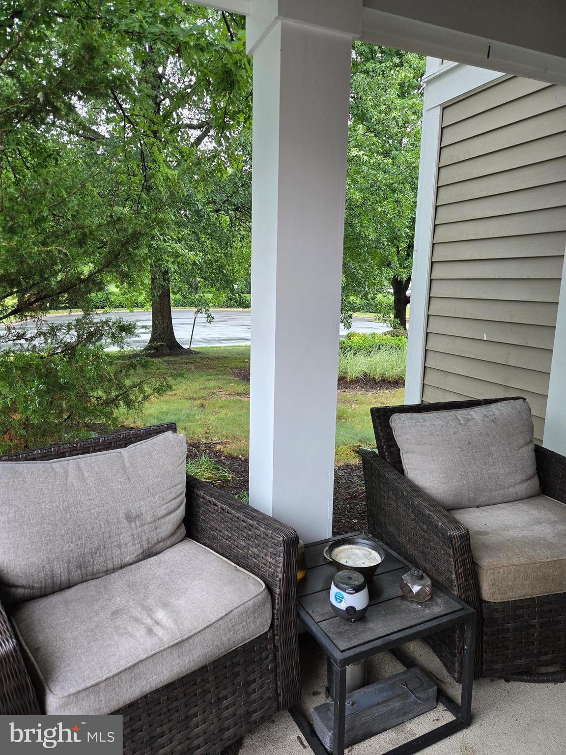 14151 Cuddy Loop, Unit 101 Woodbridge, VA 22193 - Photo 28 of 45 a outdoor living space with furniture and a potted plant