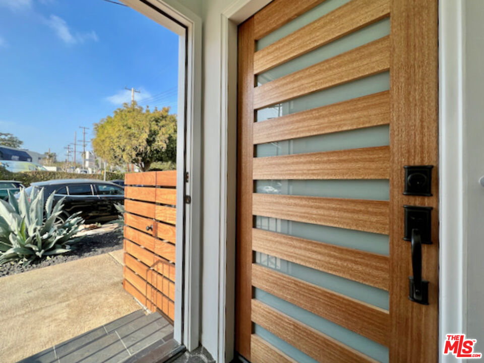 11700 Dorothy Street, Unit 2 Los Angeles, CA 90049 - Photo 29 of 31 a view of entryway and balcony