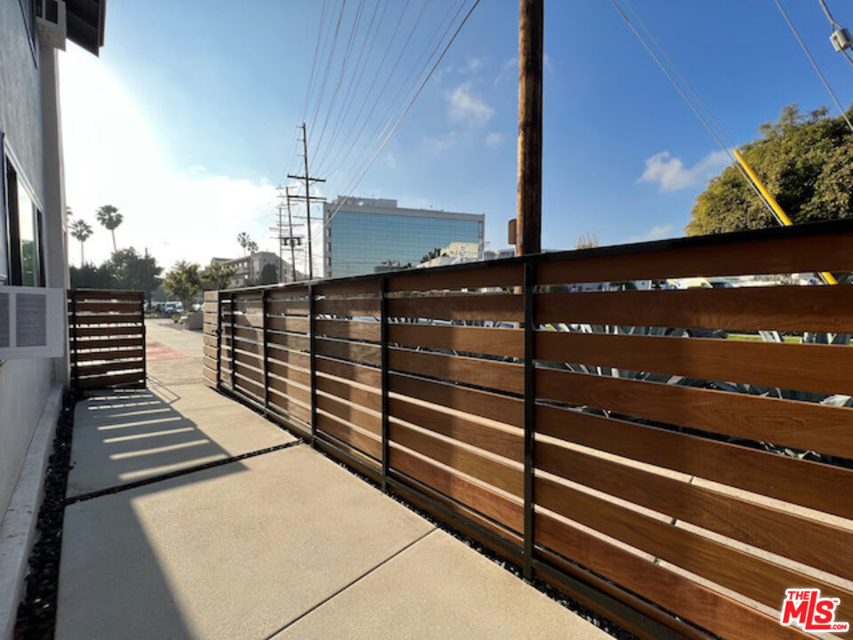 11700 Dorothy Street, Unit 2 Los Angeles, CA 90049 - Photo 4 of 31 a view of outdoor space with balcony