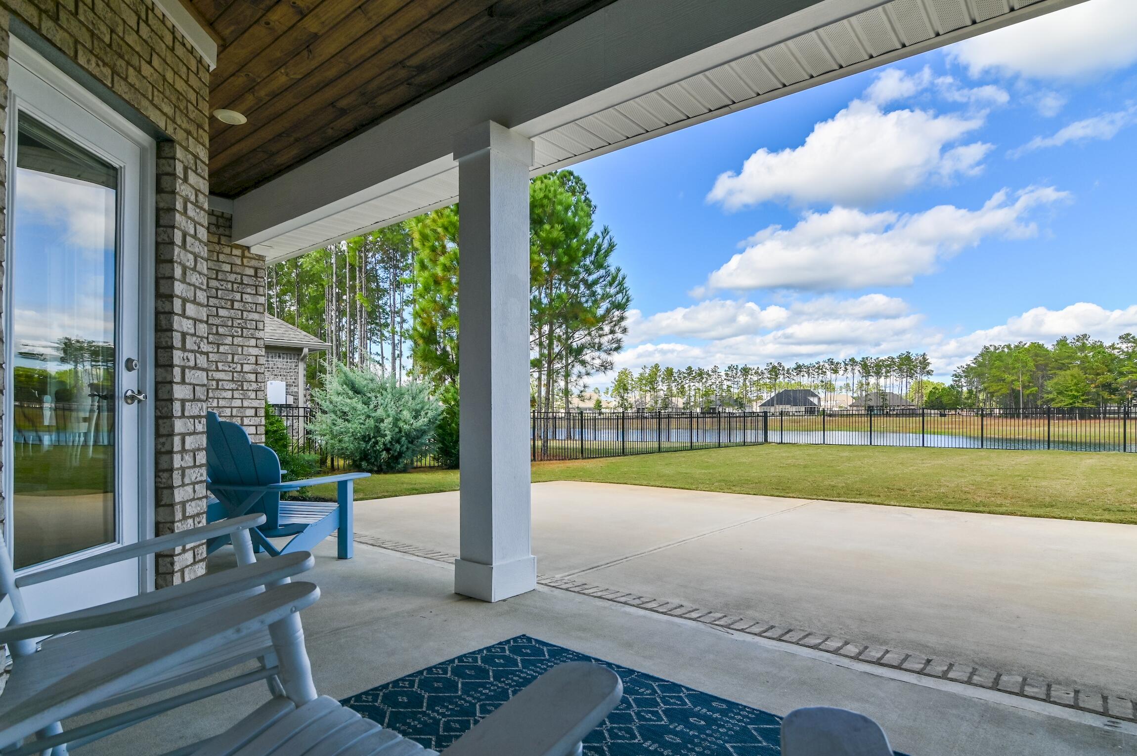 102 Mill Pond Cove Freeport, FL 32439 - Photo 30 of 46 a view of a porch with furniture and garden