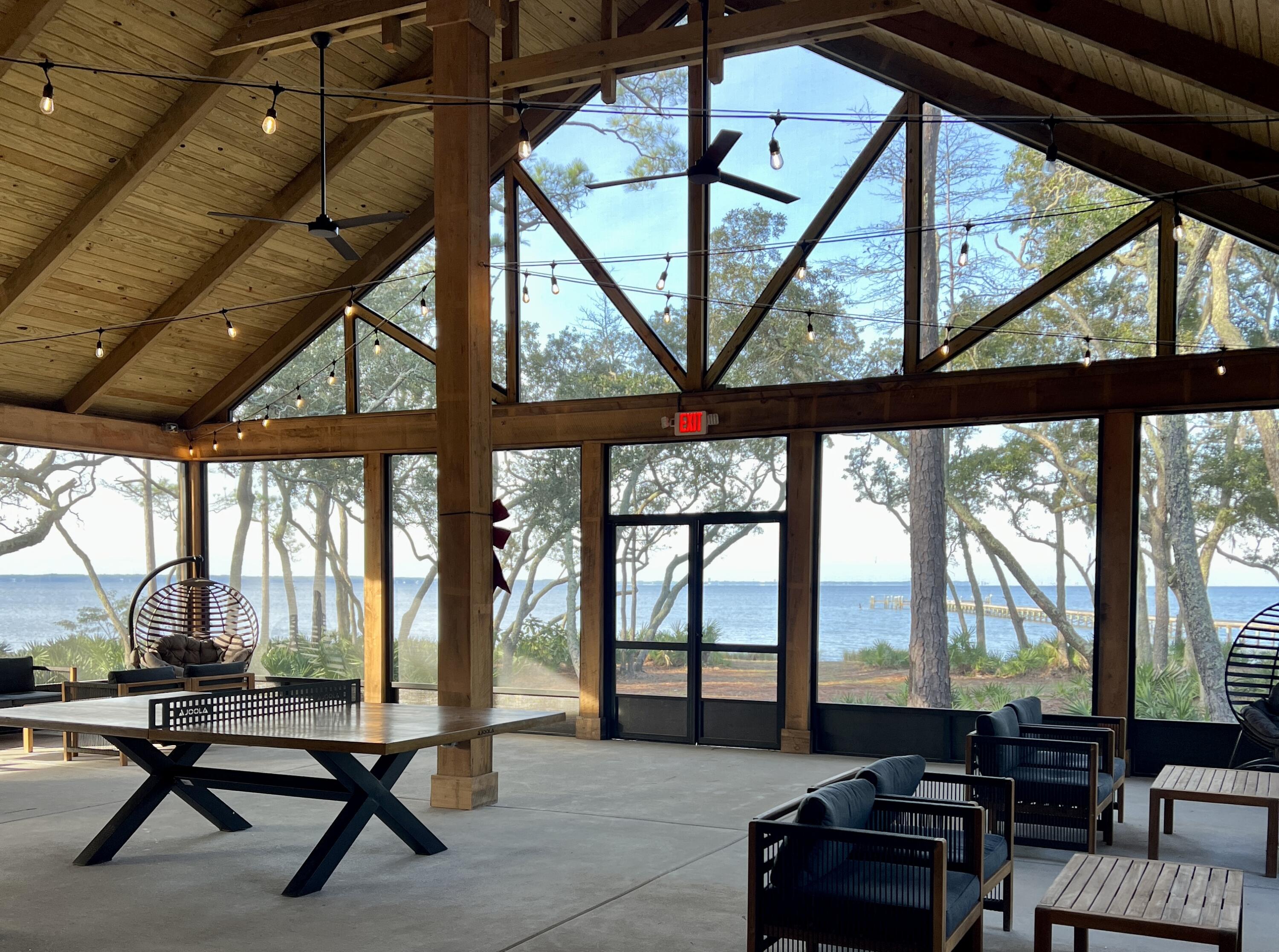 102 Mill Pond Cove Freeport, FL 32439 - Photo 45 of 46 a living room with large windows