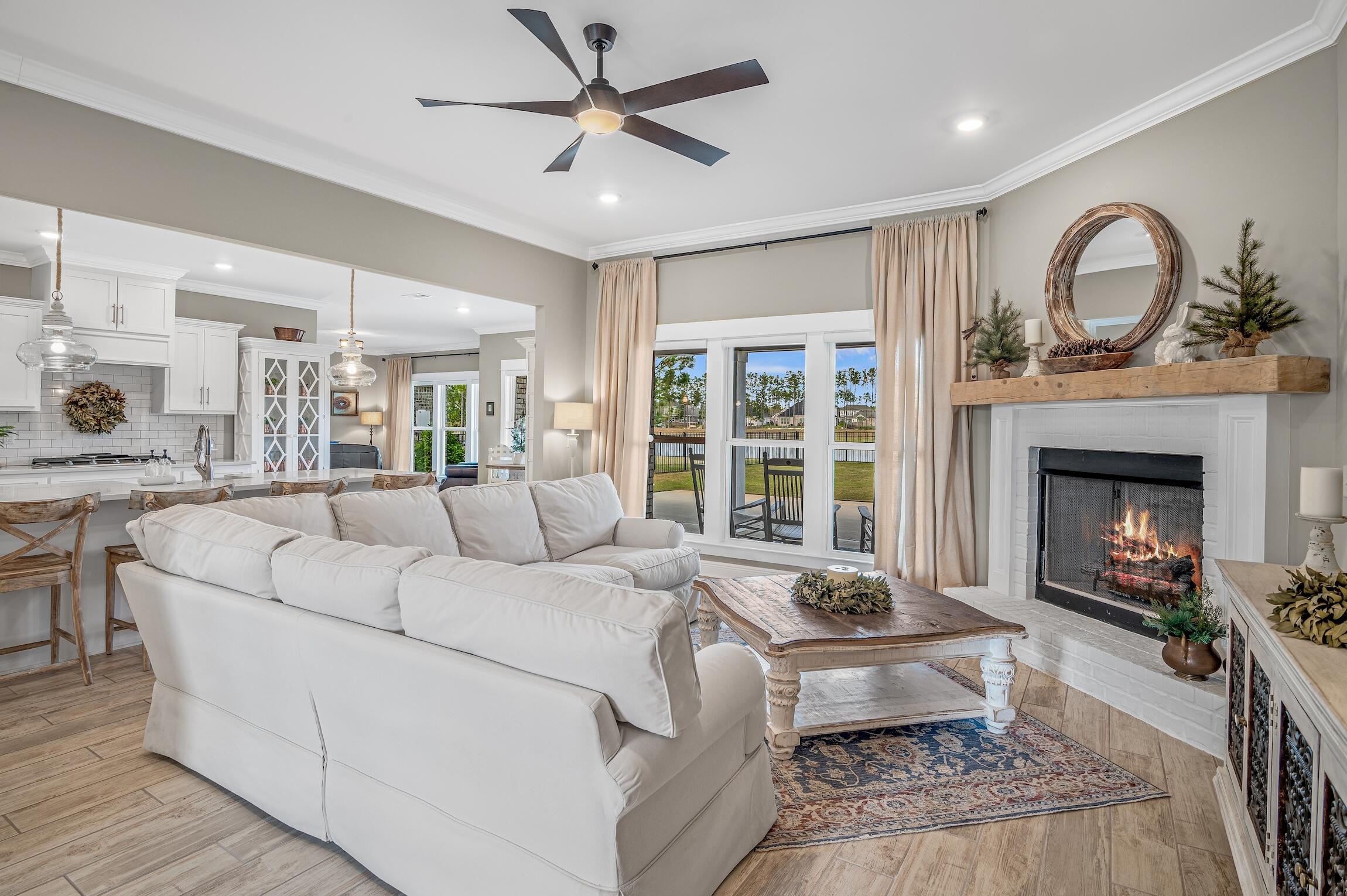 102 Mill Pond Cove Freeport, FL 32439 - Photo 8 of 46 a living room with furniture fireplace and a fireplace