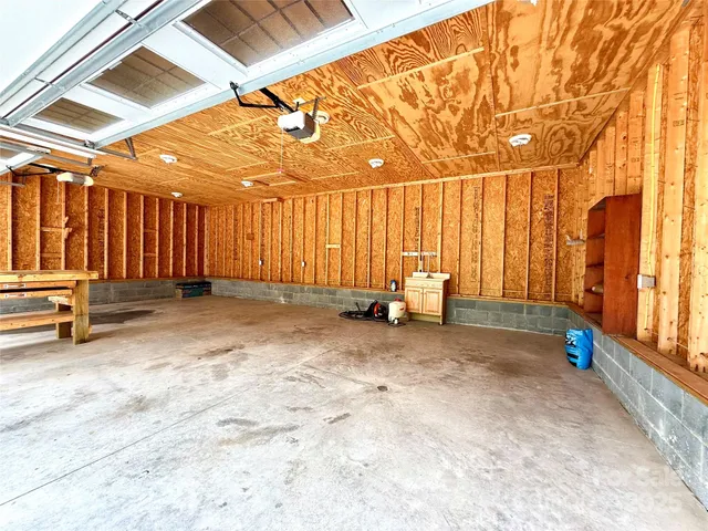 a view of outdoor space with wooden fence