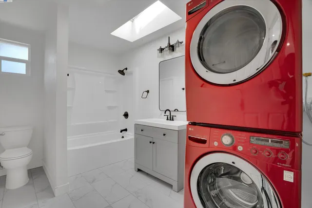 a bathroom with a toilet and a sink