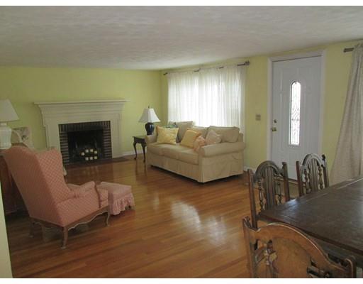 23 Tanner Road Webster, MA 01570 - Photo 12 of 30 a living room with furniture and a fireplace