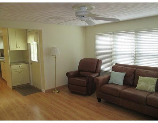 23 Tanner Road Webster, MA 01570 - Photo 13 of 30 a living room with furniture and a window