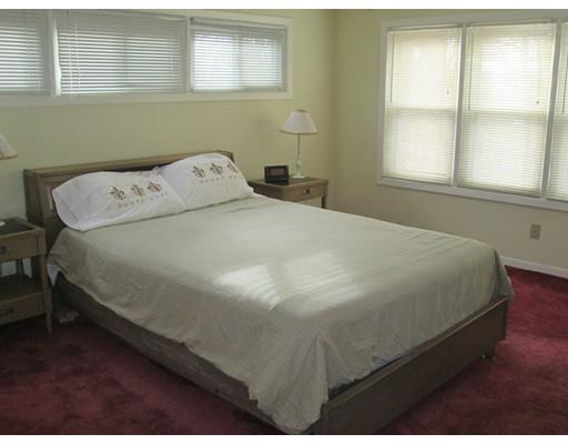 23 Tanner Road Webster, MA 01570 - Photo 26 of 30 a bedroom with a bed and a window