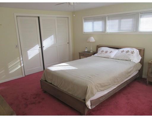23 Tanner Road Webster, MA 01570 - Photo 27 of 30 a bed sitting in a bedroom next to a window