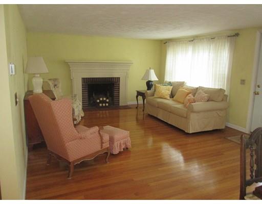 23 Tanner Road Webster, MA 01570 - Photo 9 of 30 a living room with furniture and a fireplace