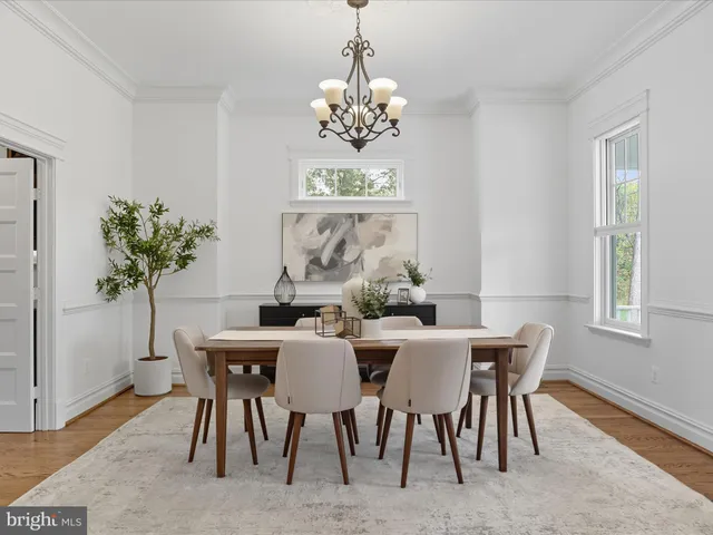 a kitchen with stainless steel appliances granite countertop a sink dishwasher a stove and a microwave oven