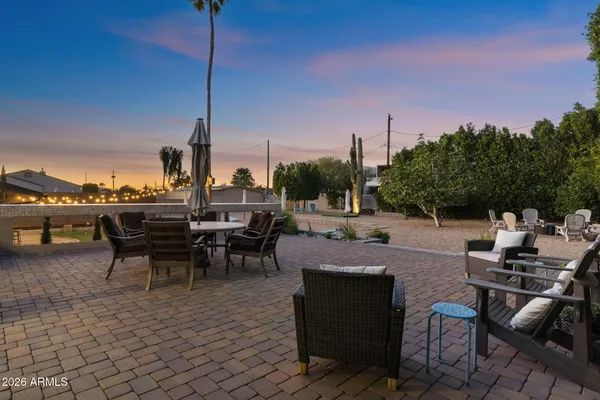a view of a terrace with furniture
