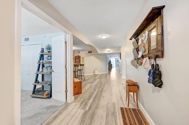 a kitchen with counter top space and cabinets