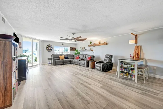a spacious bathroom with a double vanity sink mirror and bathtub