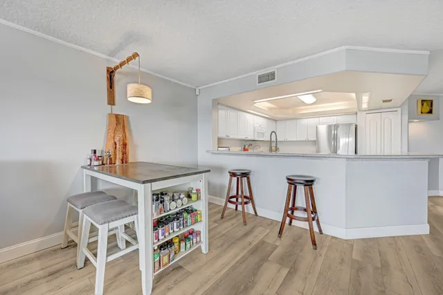 a view of a workspace with furniture