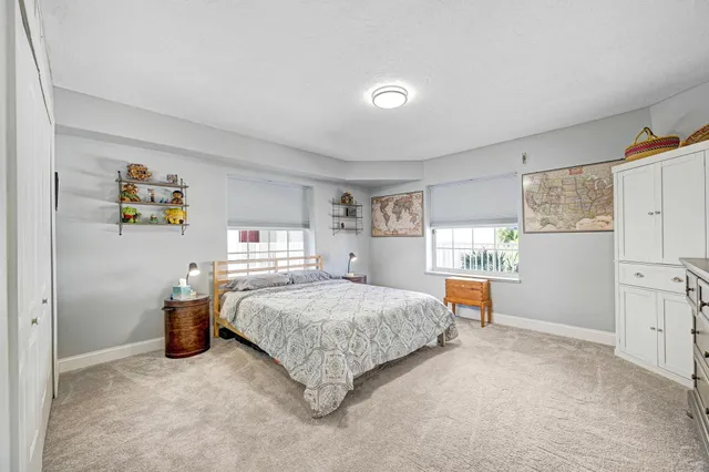 a view of parking garage with cars