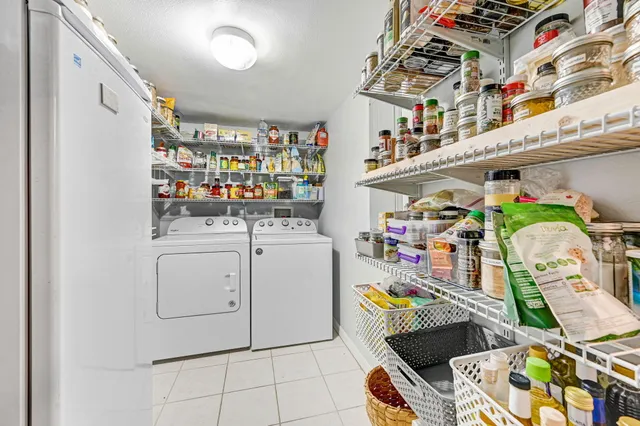 a swimming pool with outdoor seating and yard