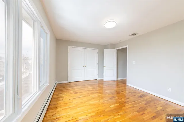 a view of an empty room and window