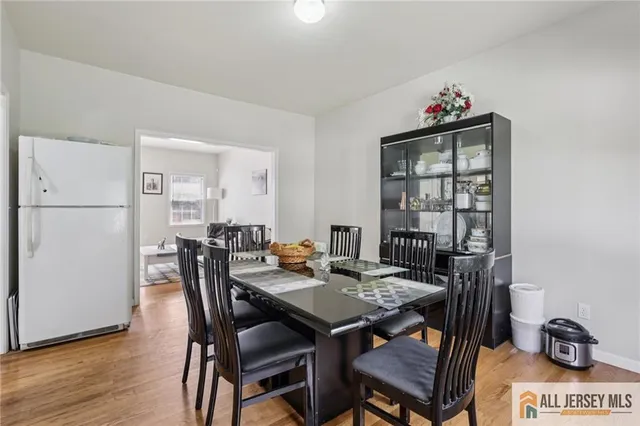 a kitchen with stainless steel appliances kitchen island granite countertop a sink and cabinets