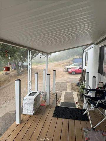 a very nice looking dining room with a large window