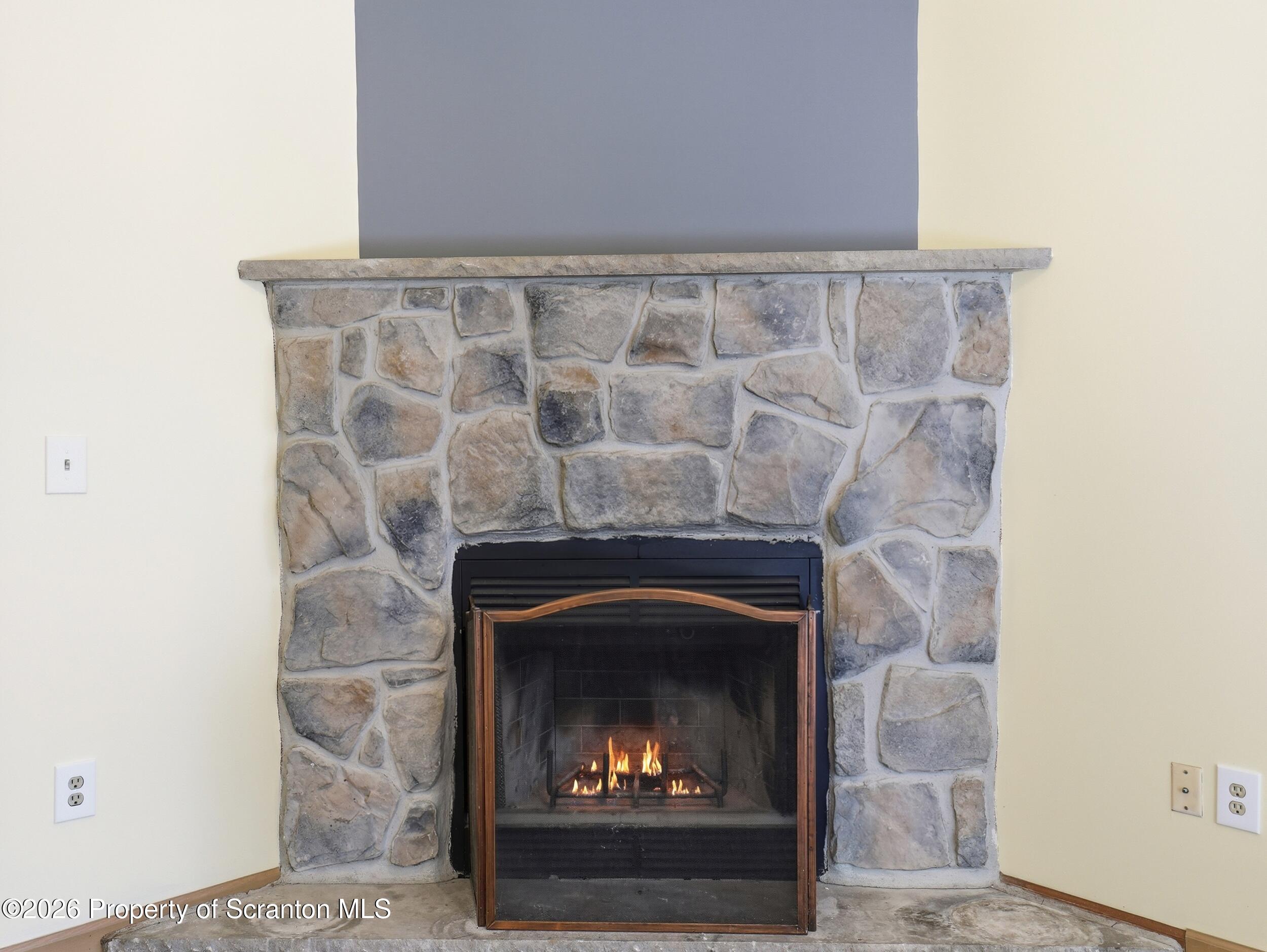 227 Image Drive Scotrun, PA 18355 - Photo 17 of 29 a room with a fireplace