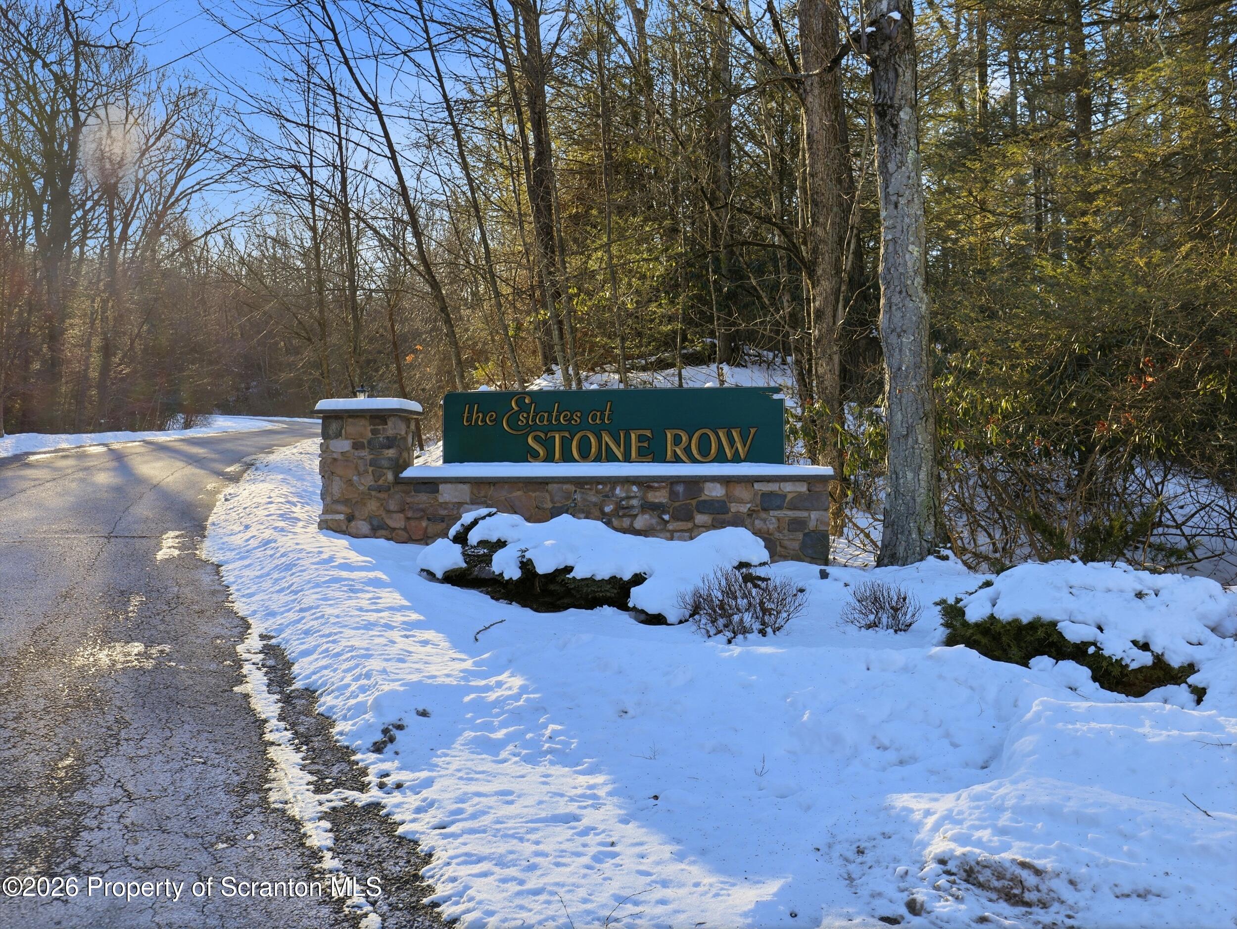 227 Image Drive Scotrun, PA 18355 - Photo 3 of 29 a sign that is sitting in the middle of forest