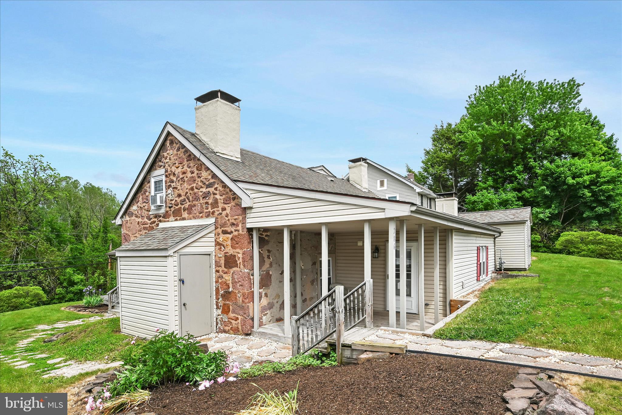 286 Schuylkill Road Birdsboro, PA 19508 - Photo 2 of 39 a front view of a house with garden